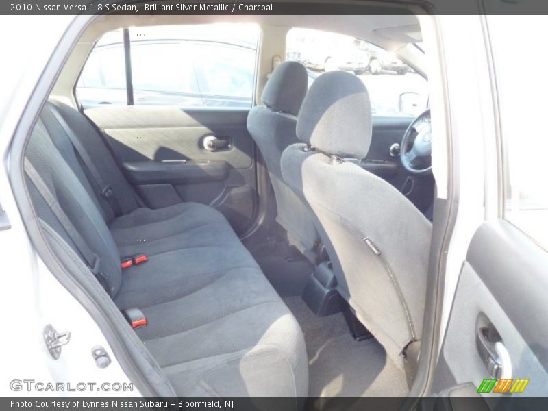 Brilliant Silver Metallic / Charcoal 2010 Nissan Versa 1.8 S Sedan