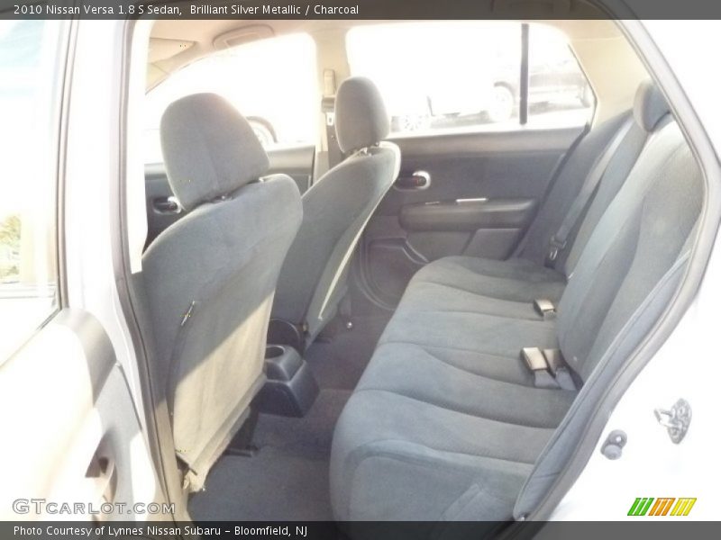 Brilliant Silver Metallic / Charcoal 2010 Nissan Versa 1.8 S Sedan