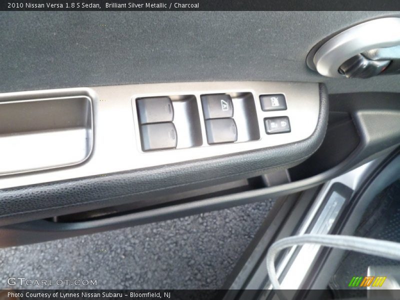 Brilliant Silver Metallic / Charcoal 2010 Nissan Versa 1.8 S Sedan
