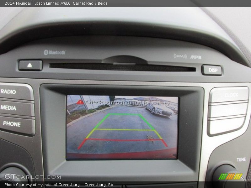 Garnet Red / Beige 2014 Hyundai Tucson Limited AWD