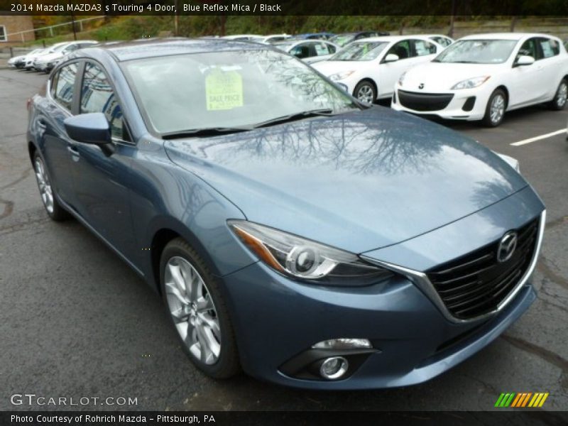 Front 3/4 View of 2014 MAZDA3 s Touring 4 Door