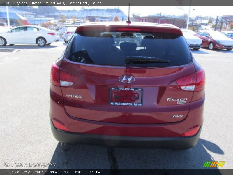 Garnet Red / Taupe 2012 Hyundai Tucson Limited AWD