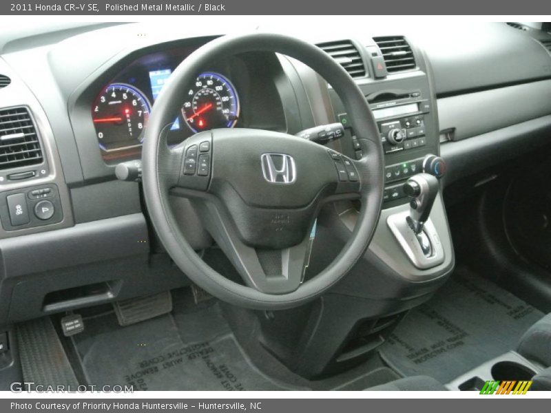 Polished Metal Metallic / Black 2011 Honda CR-V SE