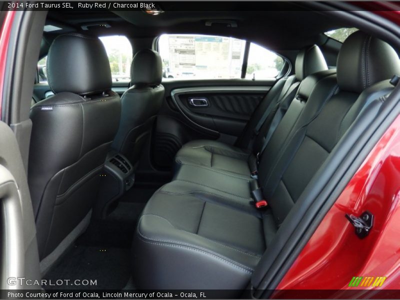 Ruby Red / Charcoal Black 2014 Ford Taurus SEL