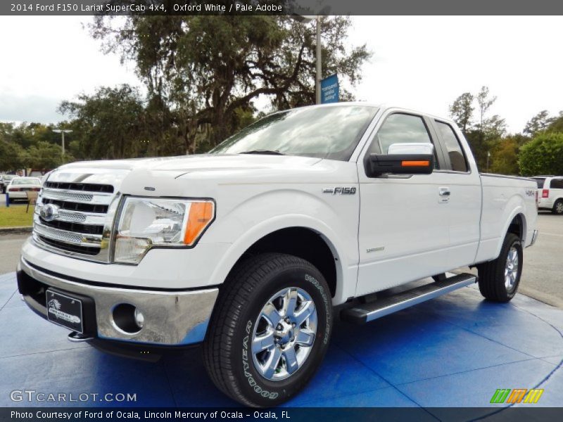 Front 3/4 View of 2014 F150 Lariat SuperCab 4x4