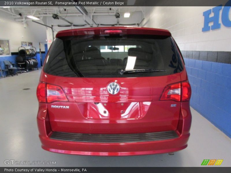 Pomegranate Red Metallic / Ceylon Beige 2010 Volkswagen Routan SE