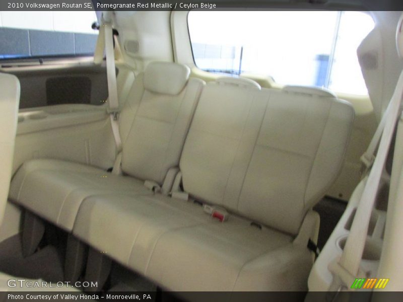 Pomegranate Red Metallic / Ceylon Beige 2010 Volkswagen Routan SE