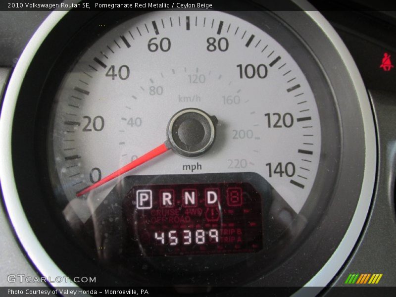 Pomegranate Red Metallic / Ceylon Beige 2010 Volkswagen Routan SE