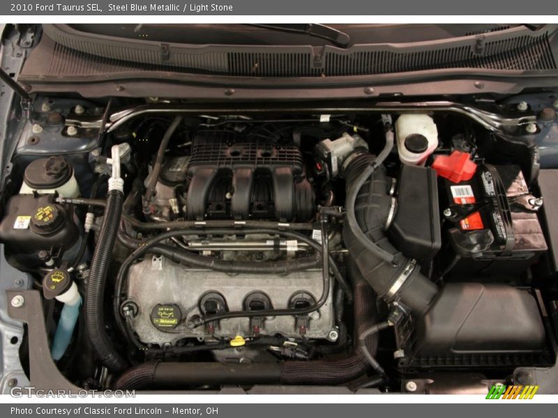Steel Blue Metallic / Light Stone 2010 Ford Taurus SEL