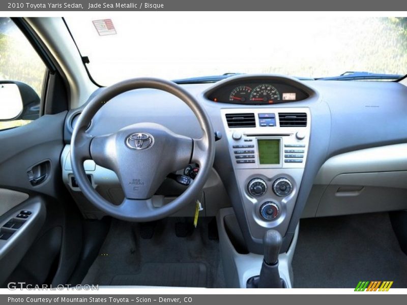 Jade Sea Metallic / Bisque 2010 Toyota Yaris Sedan
