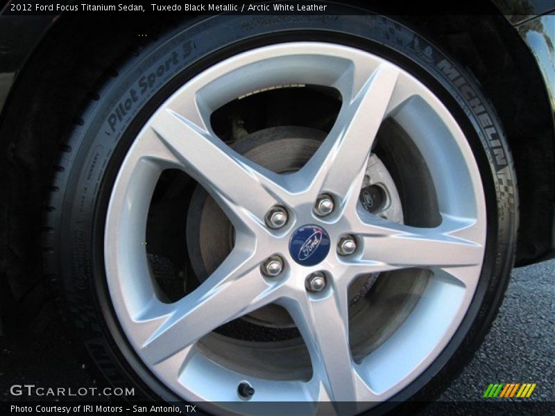 Tuxedo Black Metallic / Arctic White Leather 2012 Ford Focus Titanium Sedan