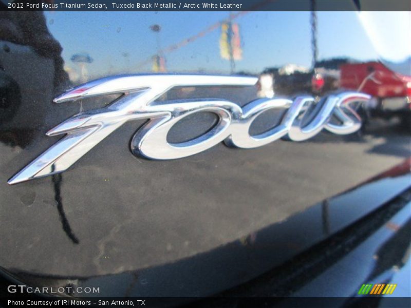 Tuxedo Black Metallic / Arctic White Leather 2012 Ford Focus Titanium Sedan
