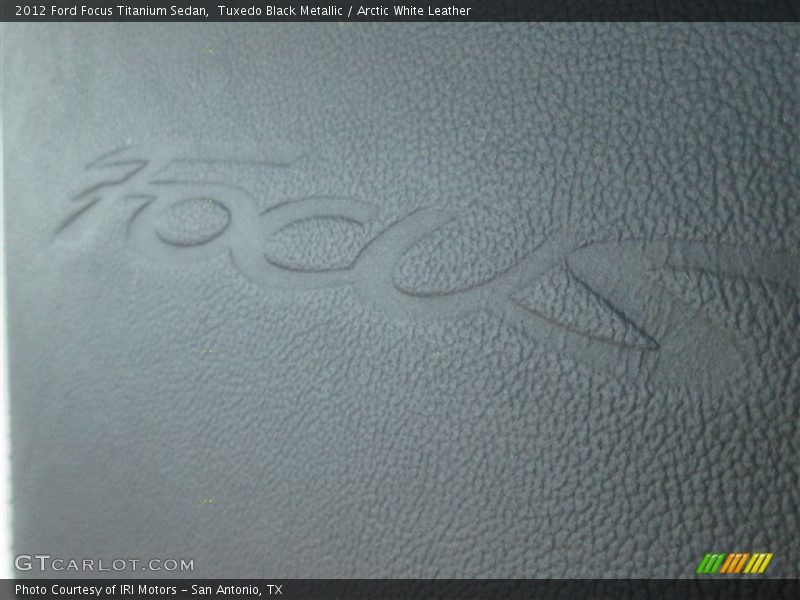 Tuxedo Black Metallic / Arctic White Leather 2012 Ford Focus Titanium Sedan