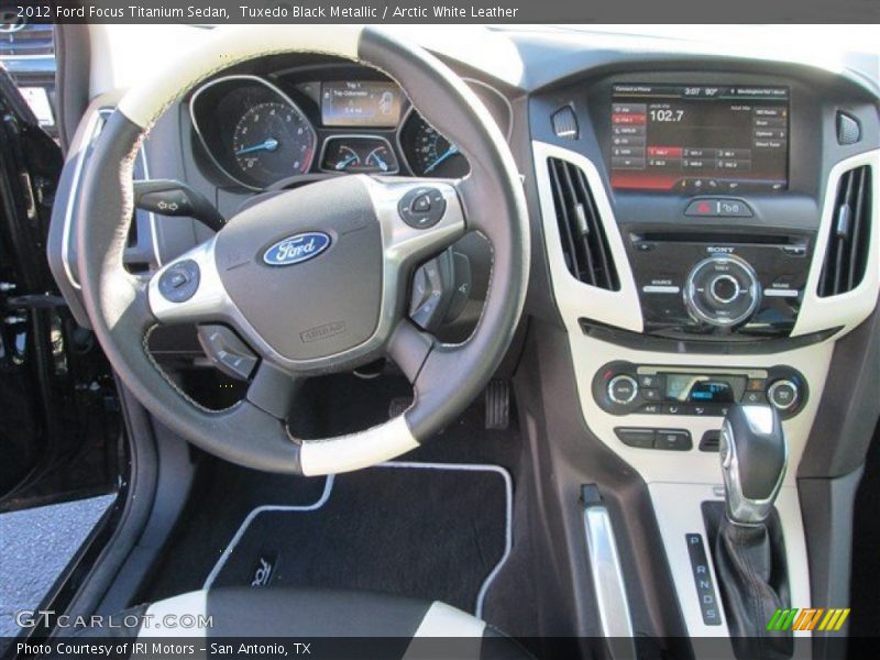 Tuxedo Black Metallic / Arctic White Leather 2012 Ford Focus Titanium Sedan