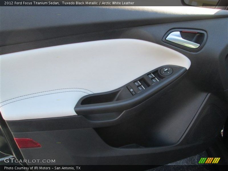 Tuxedo Black Metallic / Arctic White Leather 2012 Ford Focus Titanium Sedan