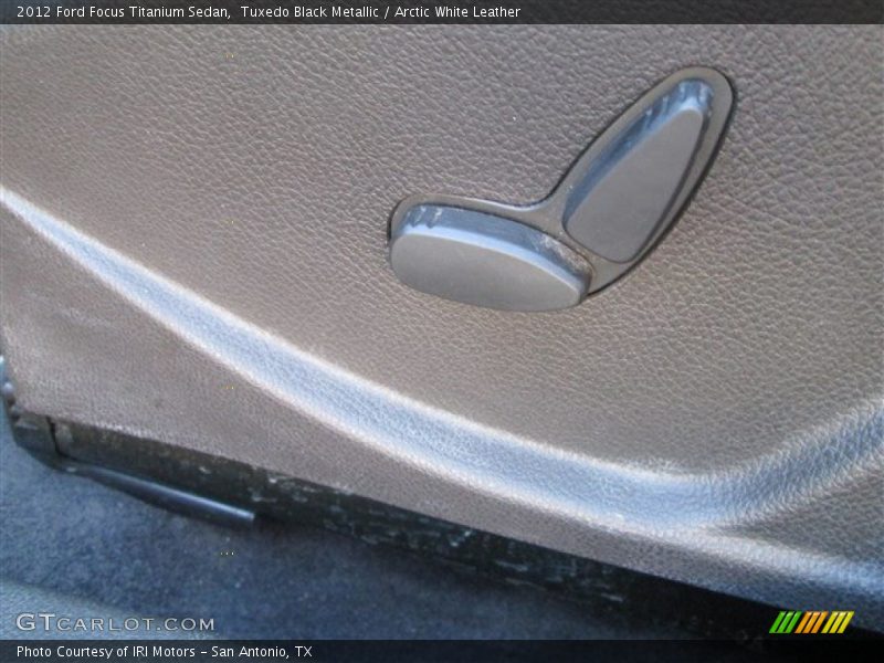 Tuxedo Black Metallic / Arctic White Leather 2012 Ford Focus Titanium Sedan