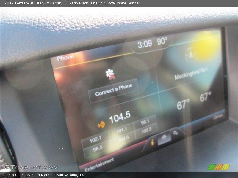 Tuxedo Black Metallic / Arctic White Leather 2012 Ford Focus Titanium Sedan