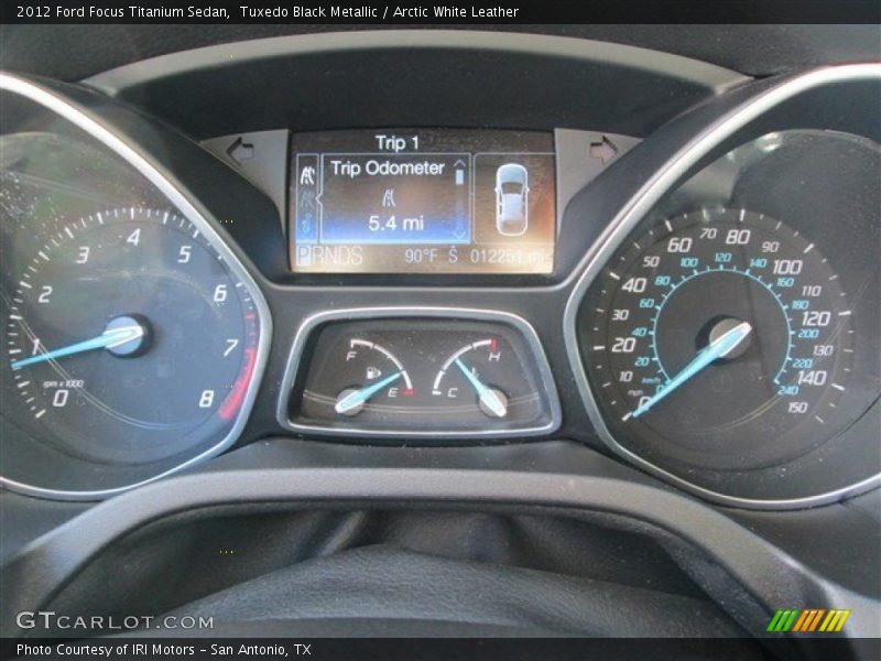 Tuxedo Black Metallic / Arctic White Leather 2012 Ford Focus Titanium Sedan