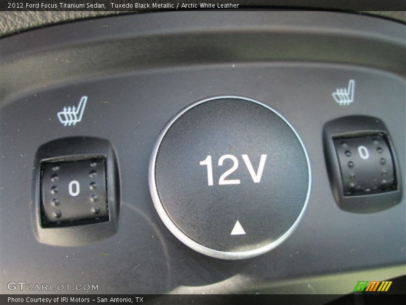 Tuxedo Black Metallic / Arctic White Leather 2012 Ford Focus Titanium Sedan