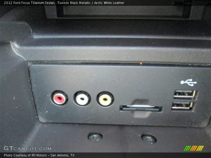 Tuxedo Black Metallic / Arctic White Leather 2012 Ford Focus Titanium Sedan