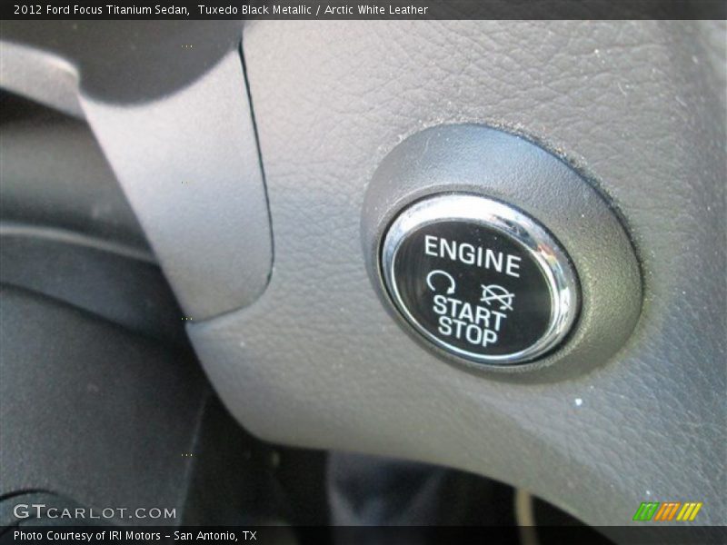 Tuxedo Black Metallic / Arctic White Leather 2012 Ford Focus Titanium Sedan