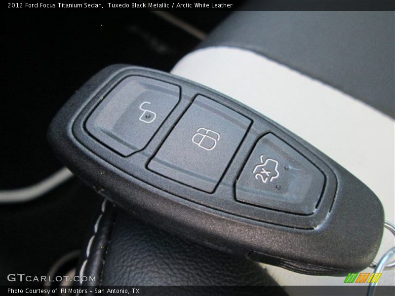 Tuxedo Black Metallic / Arctic White Leather 2012 Ford Focus Titanium Sedan