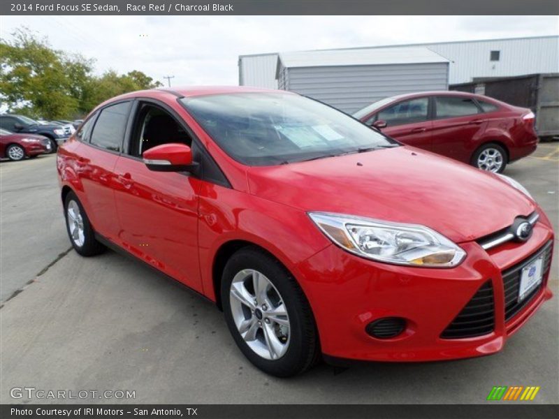 Race Red / Charcoal Black 2014 Ford Focus SE Sedan