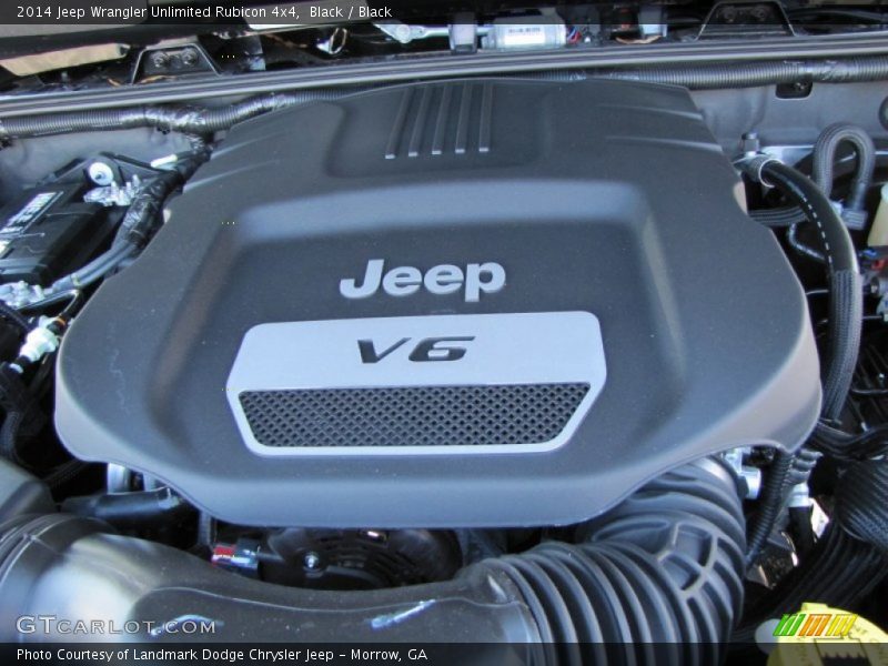 Black / Black 2014 Jeep Wrangler Unlimited Rubicon 4x4