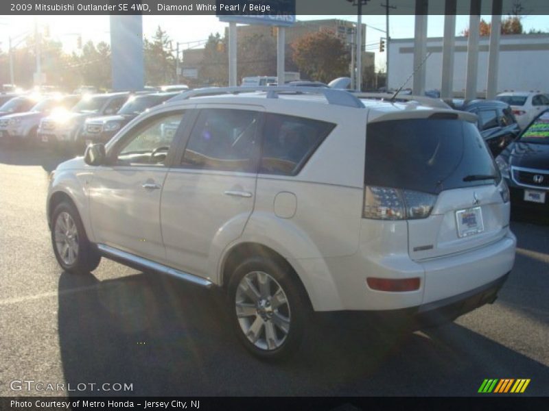 Diamond White Pearl / Beige 2009 Mitsubishi Outlander SE 4WD