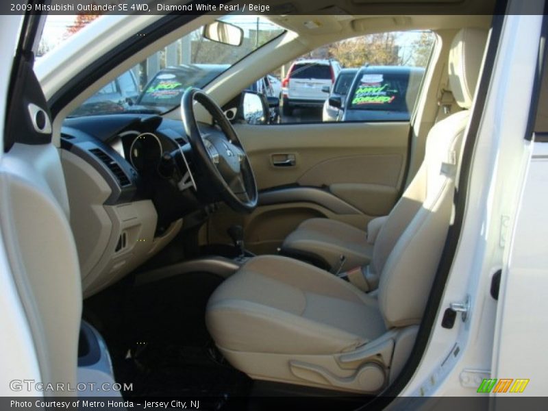 Diamond White Pearl / Beige 2009 Mitsubishi Outlander SE 4WD