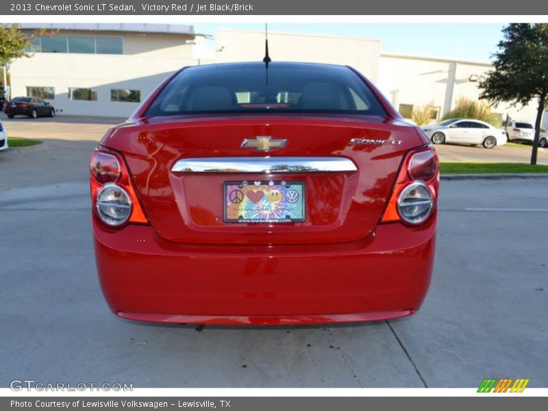 Victory Red / Jet Black/Brick 2013 Chevrolet Sonic LT Sedan