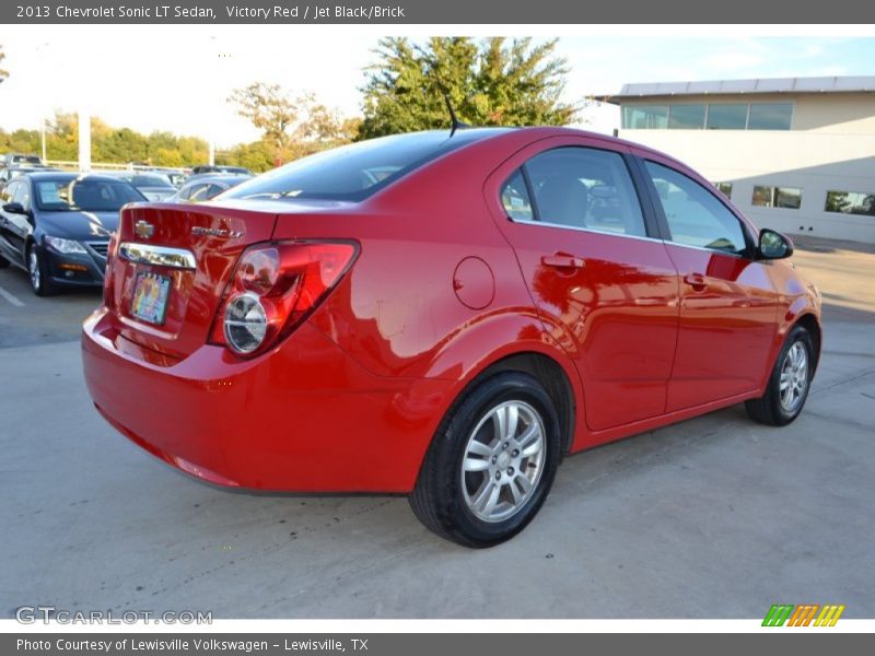 Victory Red / Jet Black/Brick 2013 Chevrolet Sonic LT Sedan