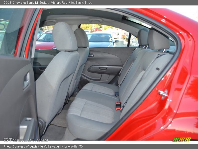 Victory Red / Jet Black/Brick 2013 Chevrolet Sonic LT Sedan