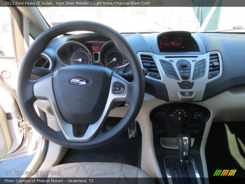 Ingot Silver Metallic / Light Stone/Charcoal Black Cloth 2011 Ford Fiesta SE Sedan