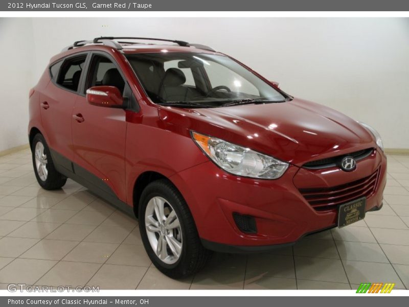 Garnet Red / Taupe 2012 Hyundai Tucson GLS