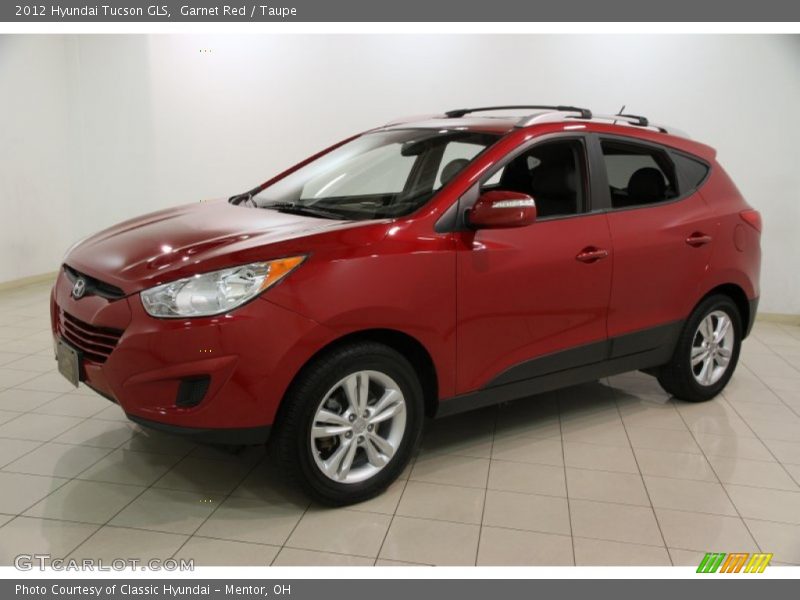 Garnet Red / Taupe 2012 Hyundai Tucson GLS