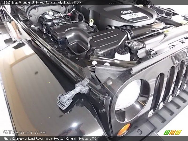 Black / Black 2013 Jeep Wrangler Unlimited Sahara 4x4