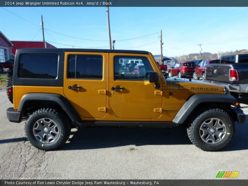 Amp'd / Black 2014 Jeep Wrangler Unlimited Rubicon 4x4