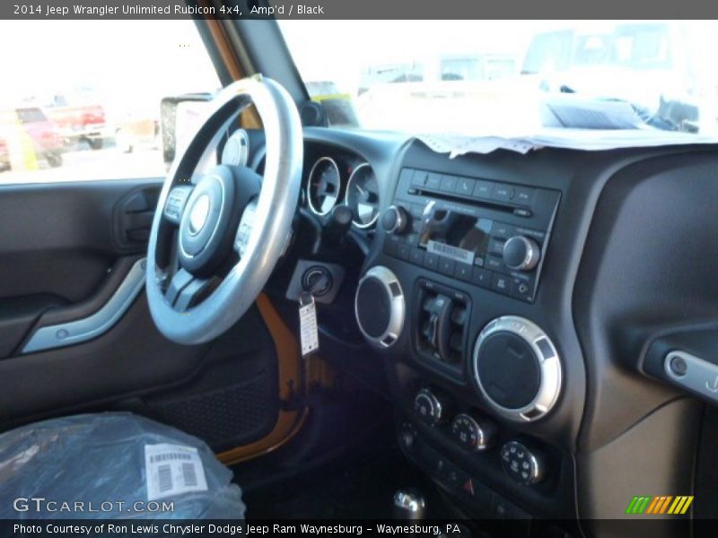 Amp'd / Black 2014 Jeep Wrangler Unlimited Rubicon 4x4