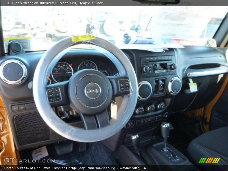 Amp'd / Black 2014 Jeep Wrangler Unlimited Rubicon 4x4