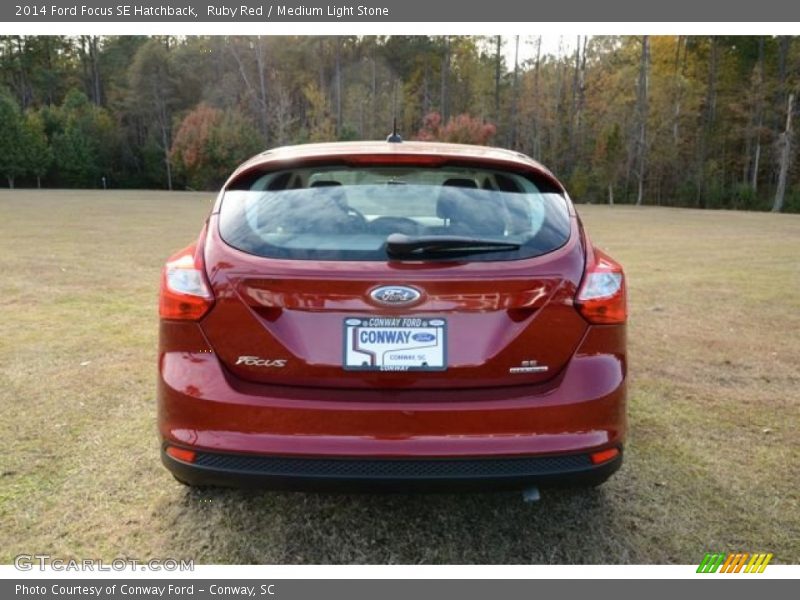 Ruby Red / Medium Light Stone 2014 Ford Focus SE Hatchback