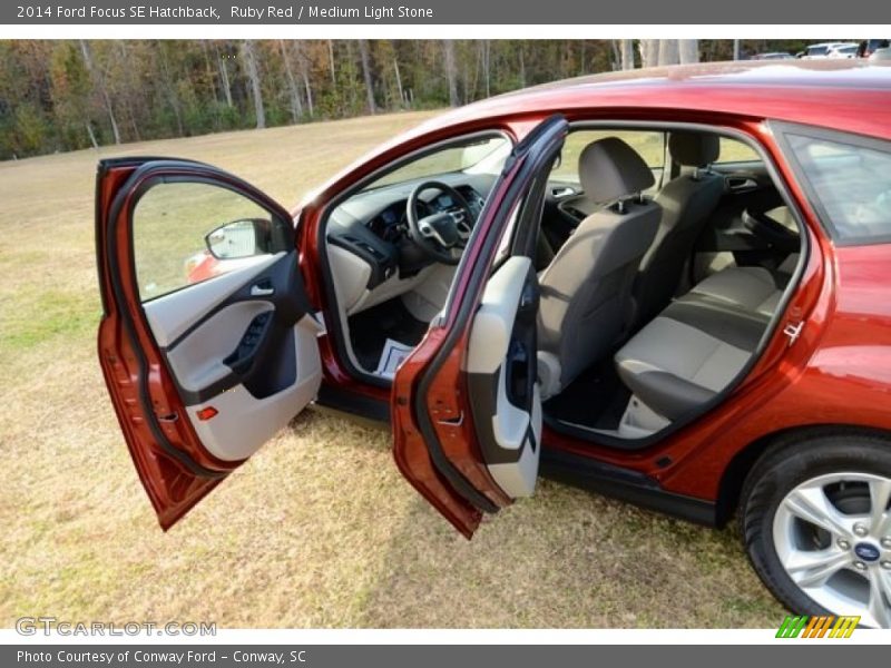 Ruby Red / Medium Light Stone 2014 Ford Focus SE Hatchback