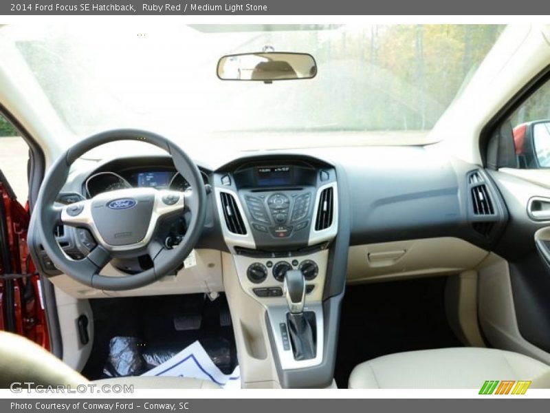 Ruby Red / Medium Light Stone 2014 Ford Focus SE Hatchback