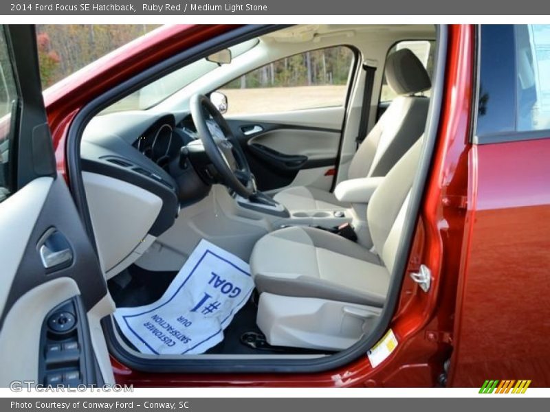 Ruby Red / Medium Light Stone 2014 Ford Focus SE Hatchback