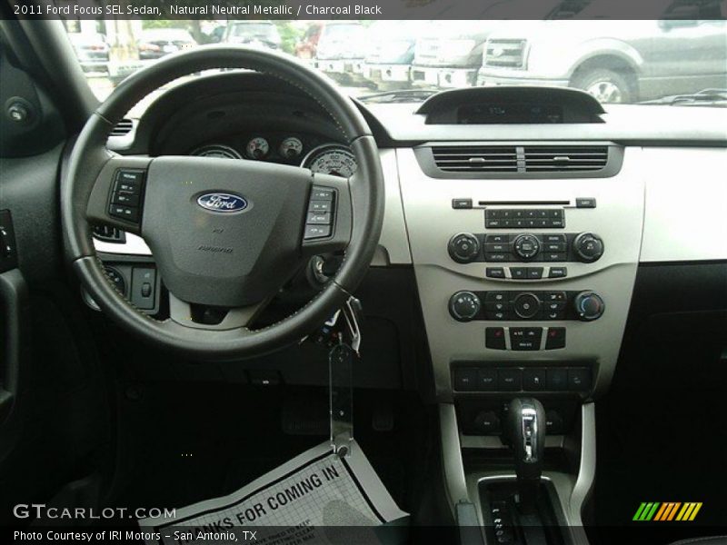 Natural Neutral Metallic / Charcoal Black 2011 Ford Focus SEL Sedan