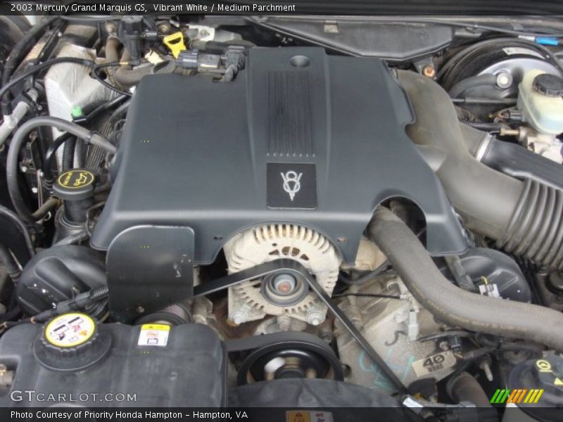 Vibrant White / Medium Parchment 2003 Mercury Grand Marquis GS