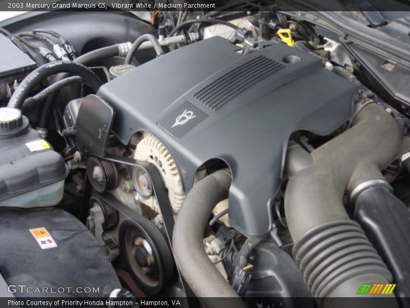 Vibrant White / Medium Parchment 2003 Mercury Grand Marquis GS