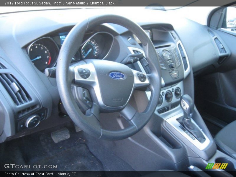 Ingot Silver Metallic / Charcoal Black 2012 Ford Focus SE Sedan