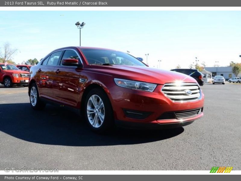Ruby Red Metallic / Charcoal Black 2013 Ford Taurus SEL