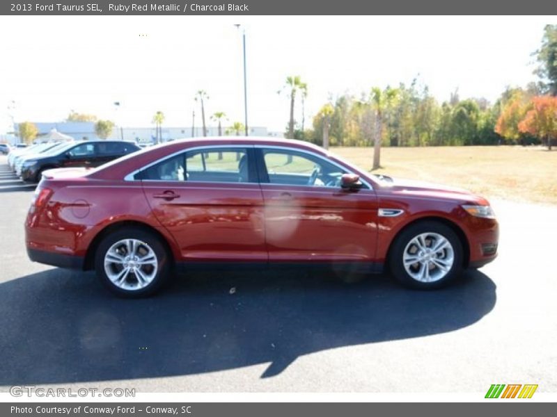 Ruby Red Metallic / Charcoal Black 2013 Ford Taurus SEL